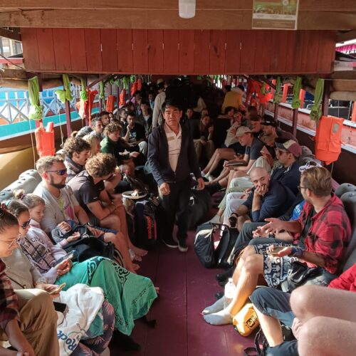 Slow Boat with Tourist